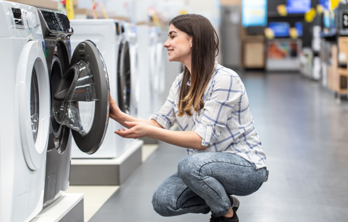 woman checking the washing machine