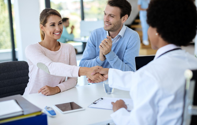 healthcare representative handshake with the client